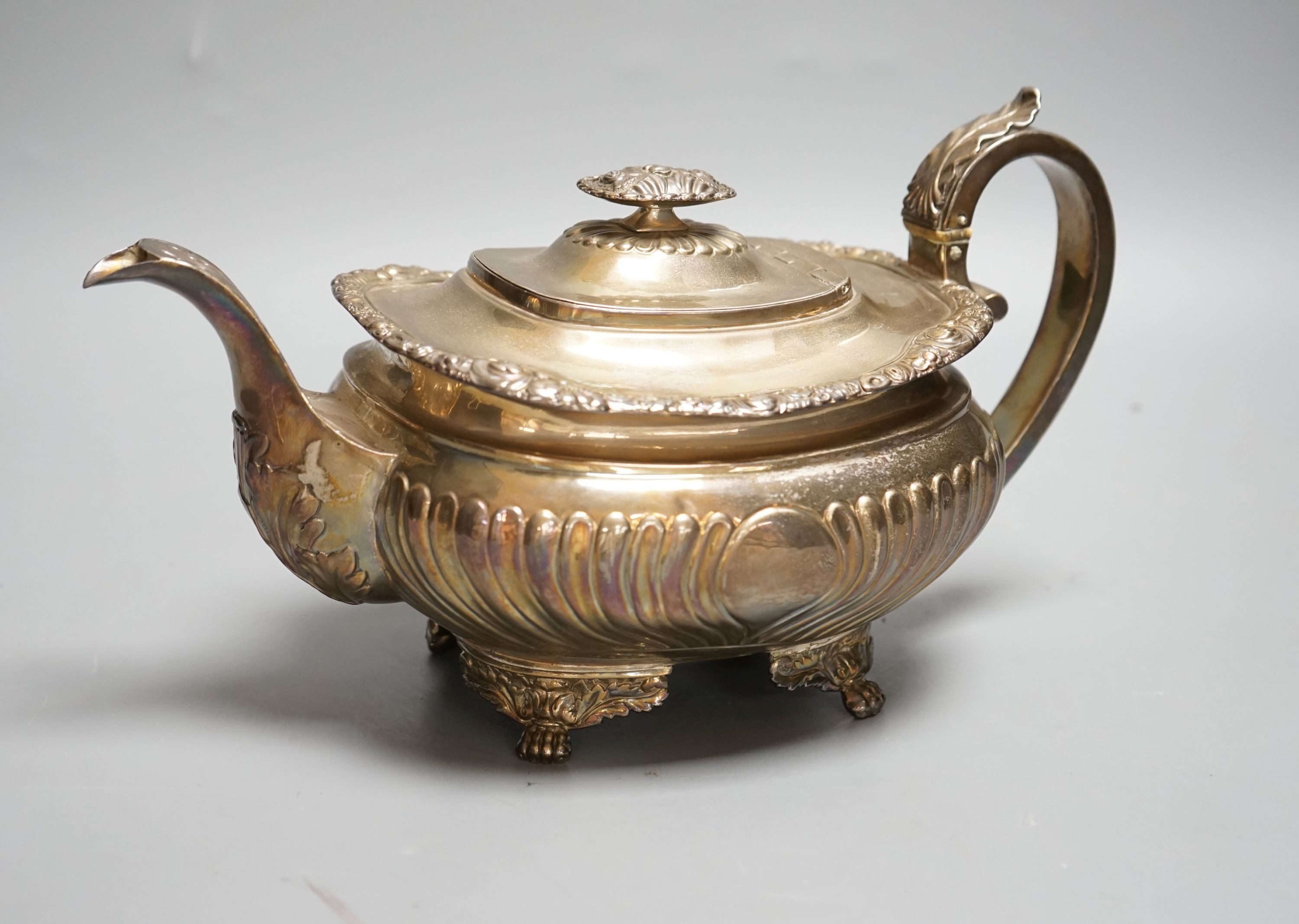 A George III silver teapot, maker's mark rubbed, London, 1817?, gross weight 26oz.